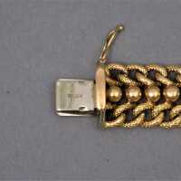 Magnificentbraided bracelet by UNOAERRE in 750/- Gold