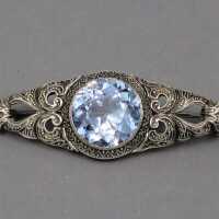 Rare silver brooch studded with a blue topas from the 1920s