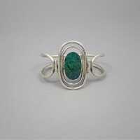 Magnificent silver bangle studded with a large malachite...