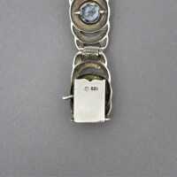 Silberarmband von Theodor Fahrner in 925/-Silber besetzt mit Blautopasen