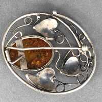 Art Nouveau Brooch in Silver with an Amber in a Cabochon