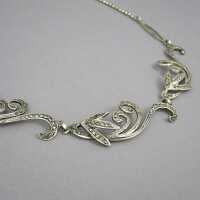 Silver necklace in Art Deco with tendrils, floral decoration and marcasites