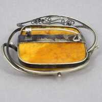Romantic butterscotch amber brooch in silver