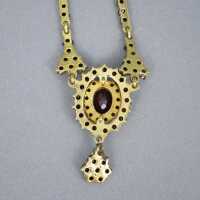 Elegant necklace in Doublé set with garnet around 1900