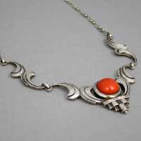 Beautiful silver necklace around 1925 set with a red coral