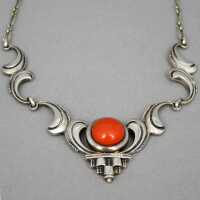 Beautiful silver necklace around 1925 set with a red coral