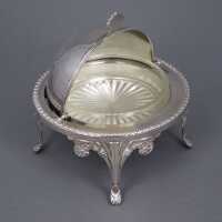 Antique caviar bowl with ornate feet and original glass...