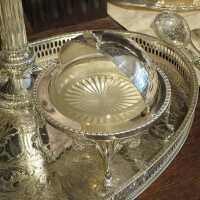 Antique caviar bowl with ornate feet and original glass insert