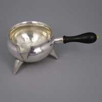Magnificent butter pan made of silver with precious wood...