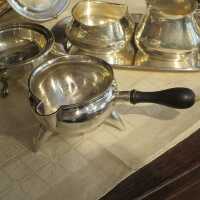 Magnificent butter pan made of silver with precious wood handle from the 18th century