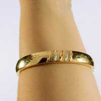 High quality ladies bracelet in 18 ct gold with delicate ornaments