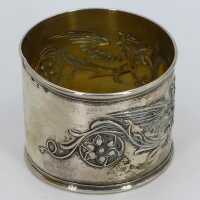 Antique pair of napkin rings in silver with griffins in original box