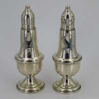 Antique salt and pepper shakers in sterling silver with...