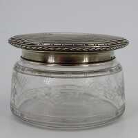 Art Nouveau glass jar with silver lid and flower cut by...