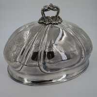Antique silvered roast bell with heraldic ornament and...