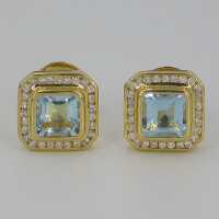Pretty stud earrings with aquamarines and diamonds in 750...