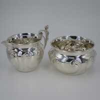Antique pair of sugar bowl and milk jug in solid silver