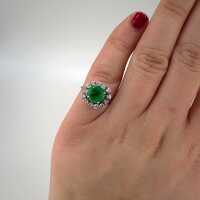 Magnificent white gold ring set with emerald and diamonds around 1960/70