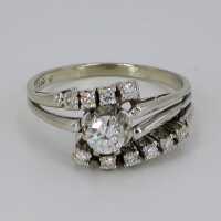 Elegant geometric white gold ring set with diamonds...