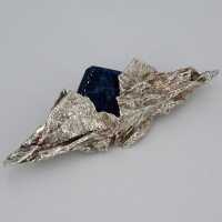 Abstract brooch crafted with rare sodalite