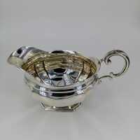 Elegantly shaped antique gravy boat from 1899 in sterling...