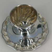 Beautiful egg cup in sterling silver with a solid saucer