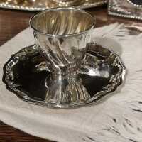 Beautiful egg cup in sterling silver with a solid saucer