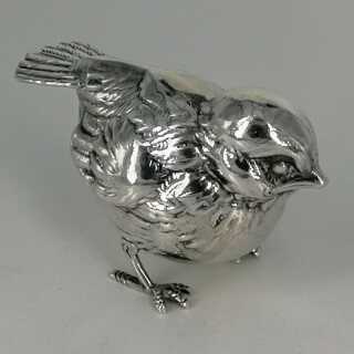 Small, detailed shaped garden bird in solid silver around 1925