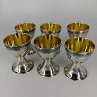 Rare set of 6 egg cups in silver and gold with acanthus frieze