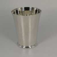 Elegantly shaped mug in solid silver