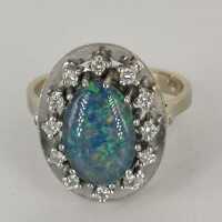 Beautiful ladies ring in 585 gold with fiery opal triplet and twelve diamonds