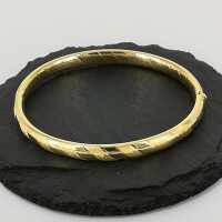 Beautiful oval two-piece bangle in gold
