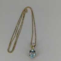 Elegant pendant with natural, large aquamarine in gold including chain