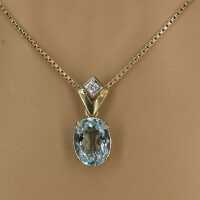 Elegant pendant with natural, large aquamarine in gold including chain