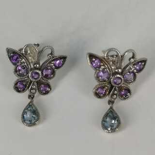 Romantic silver stud earrings with amethysts and topazes