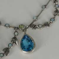 Adorable colllier in sterling silver with various gemstones