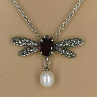 Delicate butterfly necklace in silver with garnet and pearl