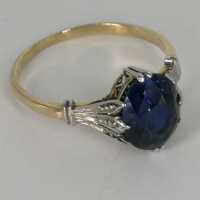 Precious womens ring in yellow and white gold with a sapphire