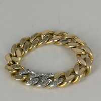 Handmade curb chain ring in gold with diamonds
