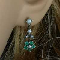 Beautiful ladies earrings in silver with pearls and emeralds