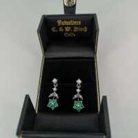 Beautiful ladies earrings in silver with pearls and emeralds
