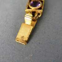 Link bracelet with amethyst cabochons mounted in gold 