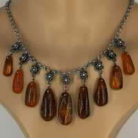Beautiful necklace in silver with natural amber