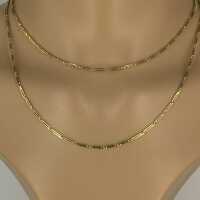 Solid gold chain in chopsticks pattern in the style of...