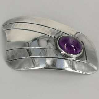 Brooch with an amethyst in silver from the golden fifties