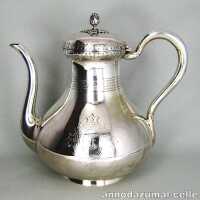 Georgian silver coffeepot with engraved decor