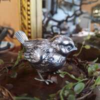 Small, detailed shaped garden bird in solid silver