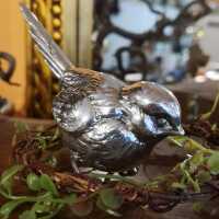 Detailed shaped garden bird in solid silver