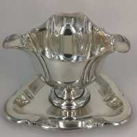 Triangular sauce boat with plate in solid silver from...