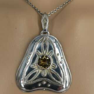 Art Nouveau pendant in silver set with a citrine